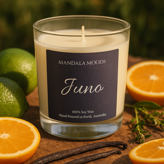 Juno - Sunlit citrus, kaffir lime and golden orange with soft sandalwood evoke calm, centering, and deeply serene feelings 300ml soy wax